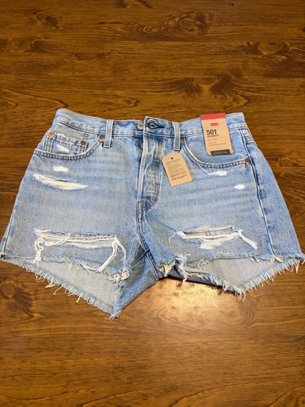 Levi's Light Blue Distressed Jean Shorts with button fly